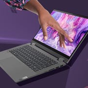 hand touching lenovo touchscreen laptop